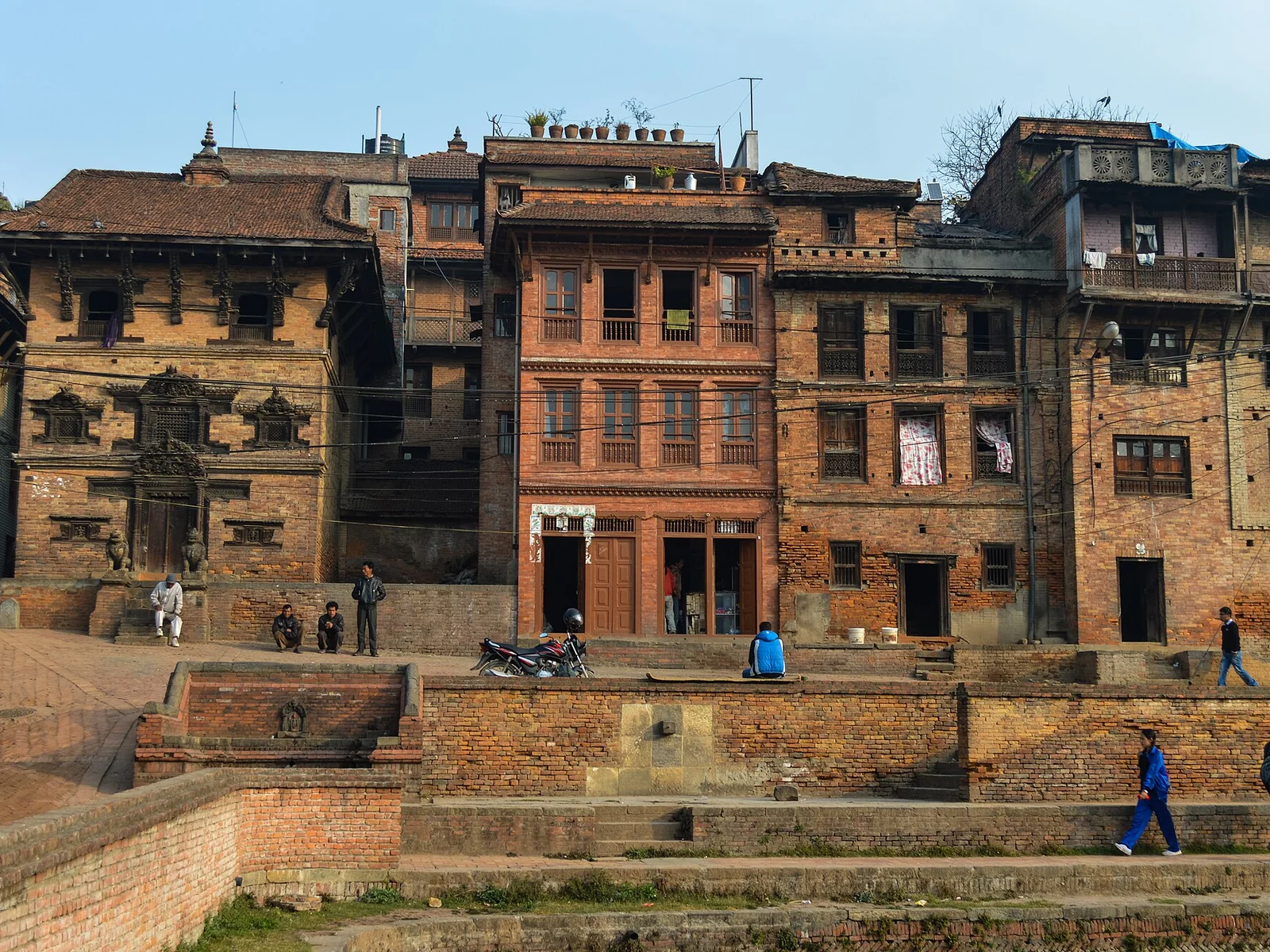 Traditional Newari houses: brick façades with carved wooden windows